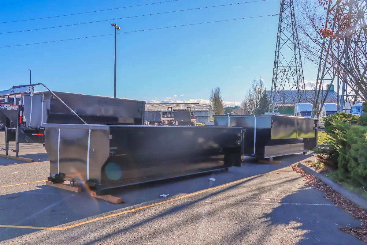 Roll-off dumpster ready for waste disposal at job site for Yard Waste Dumpster Rental in Eden Isle